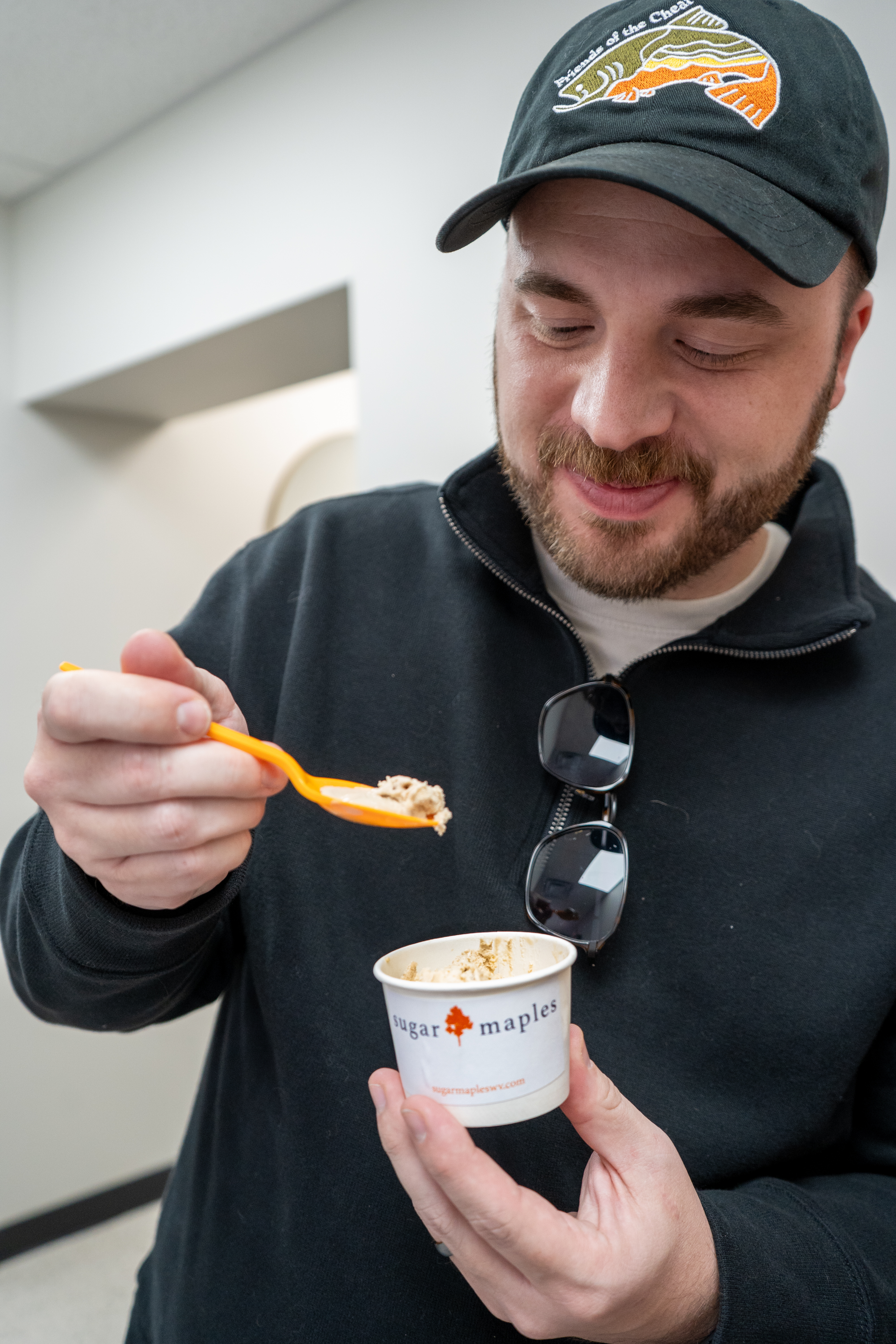 Zack tasting ice cream at Sugar Maples